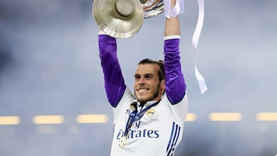 Gareth Bale of Real Madrid lifts the Champions League trophy after beating Juventus in the 2017 final in Cardiff. Getty