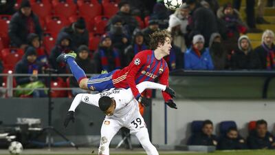 CSKA Moscow’s Mario Fernandes in action against Bayer Leverkusen’s Benjamin Henrichs. Sergei Karpukhin / Reuters