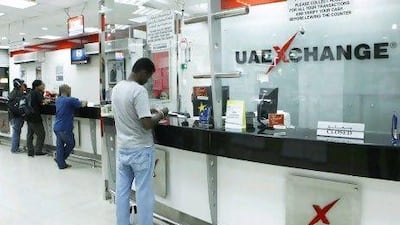 Dubai, 22nd October 2011. Interior of UAE Exchange at their Karama branch, on weekends lots of expatriates troop to this remittance centre. ( Jeffrey E Biteng / The National )