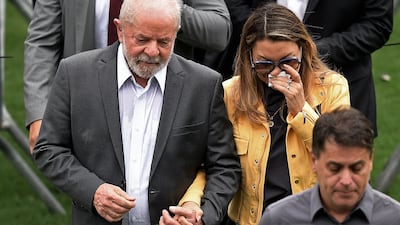 Brazil's President Luiz Inacio Lula da Silva with his wife Rosangela da Silva attends the wake of Pele at the Urbano Caldeira Stadium in Santos. AFP
