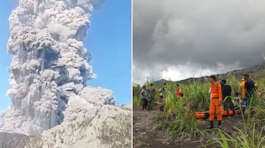 Rescue workers gather at Mount Dukono, which spewed hot ash at least 10km into the air. AFP / Reuters