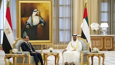 ABU DHABI, UNITED ARAB EMIRATES - November 14, 2019: HH Sheikh Mohamed bin Zayed Al Nahyan, Crown Prince of Abu Dhabi and Deputy Supreme Commander of the UAE Armed Forces (R) meets with HE Abdel Fattah El Sisi, President of Egypt (L), after conferring the Order of Zayed medal, during a state visit reception at Qasr Al Watan. ( Hamad Al Kaabi / Ministry of Presidential Affairs ) ---