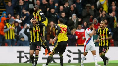 Jose Holebas, left, celebrates scoring Watford's second goal in the 2-1 win over Crystal Palace. Reuters