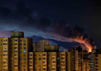 Fire and smoke rise in Kyiv after Russian drone and missile strikes. Reuters