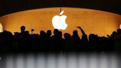 Among Saxo Bank's outrageous predictions for next year include a 50 per cent drop in the share price of tech bellwether Apple. Spencer Platt / AF