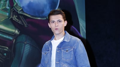 Tom Holland, in checked trousers and a denim jacket, arrives for a 'Spider-Man: Far From Home' press conference in Seoul on July 1, 2019. EPA