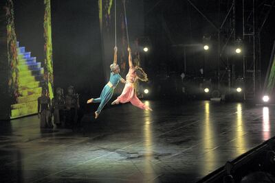 Actors glide across the stage in the opening performance of '1001 Nights: The Last Chapter'. Satish Kumar / The National