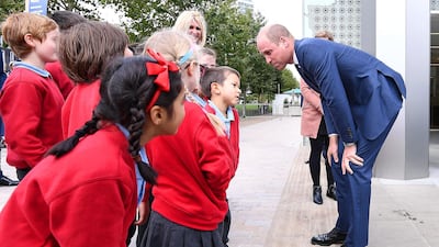 The couple met local school-children during the visit to the Aga Khan Centre. AFP