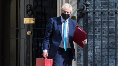 Prime Minster Boris Johnson departs 10 Downing Street ahead of the State Opening of Parliament in London. EPA
