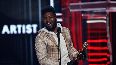 Khalid accepts the Top New Artist award. Reuters