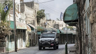 A police vehicle with iron meshing.
