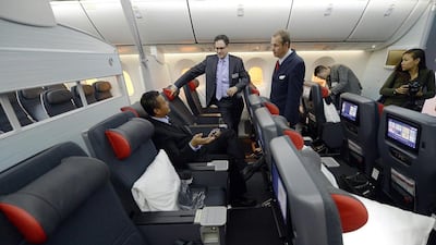 People tour the Air Canada’s Boeing 787 Dreamliner premium economy section. Aaron Harris / Reuters