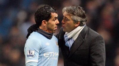 Fortunes began to change slightly for the star striker with the arrival of Roberto Mancini, who took over from Mark Hughes as the new manager. Jon Super / AP Photo