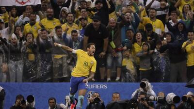 Neymar celebrates scoring Brazil's second goal in the 3-0 win against Paraguay. Andre Penner / AP Photo