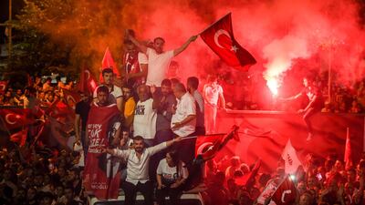 People celebrate after Binali Yildirim, who was favored by President Recep Tayyip Erdogan, conceded his defeat in the rerun of the mayoral election in Istanbul, Turkey. Burak Kara / Getty Images