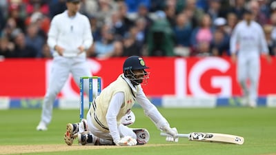 India batsman Jasprit Bumrah takes a tumble as he hits a boundary off a delivery from Stuart Broad, who conceded a Test record 35 in a single over at Edgbaston on July 2. Getty