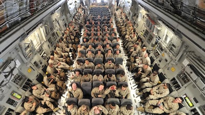 US servicemen before their departure to Afghanistan from the US transit centre Manas airport, 30km outside Kyrgyzstan's capital Bishkek, on March 27, 2012. AFP