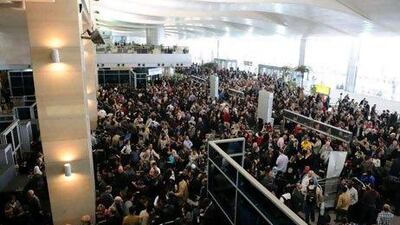 There was chaos at Cairo airport in the days after the anti-government protests began. Insurers offer limited protection for civil strife. Miguel Medina / AFP