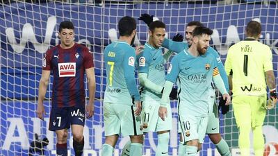 Barcelona players congratulate Neymar after scoring Barcelona’s fourth goal. Juan Herrero / EPA
