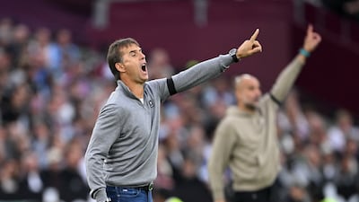 West Ham manager Julen Lopetegui with his Manchester City counterpart Pep Guardiola in the background. Getty Images