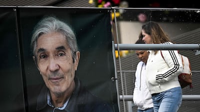 A mural of Franco-Algerian writer Boualem Sansal displayed on a bridge in Beziers, southern France. AFP