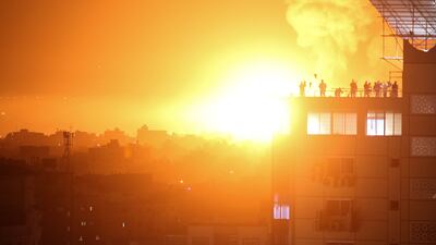 Flames and smoke rise after Israel bombarded south Lebanon and Gaza in the early hours of Friday. EPA