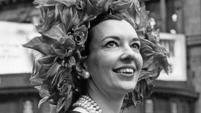 Journalist and novelist Una-Mary Parker arrived wearing a flamboyant hat decorated with red silk rose. Getty Images