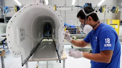 A Worker working on the parts for Airbus and Boeing in the Assembly section at the Strata Manufacturing facility in Al Ain. Pawan Singh/The National
