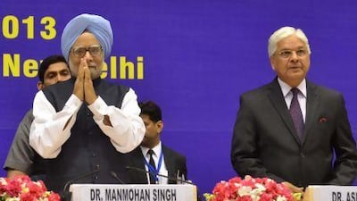 Indian prime minister, Manmohan Singh, with law minister Ashwani Kumar, who is accused of interfering in a coal-mining rights investigation, at a conference in New Delhi.