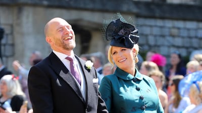 Mike Tindall and Zara Tindall, wearing a teal and black dress, arrive at St George's Chapel at Windsor Castle before the wedding of Prince Harry and Meghan Markle on May 19, 2018. Getty Images