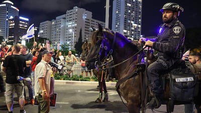 Mounted police officers at a rally in Tel Aviv calling for the release of Israelis held hostage in Gaza since October. AFP