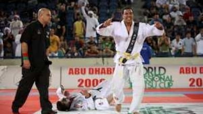 Faisal Fahed Alkitbi from Abu Dhabi pins down Yazan Janeb of Jordan at the World Professional Jiu Jitsu Cup at Zayed Sports City.