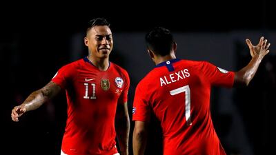 Eduardo Vargas, left, and Alexis Sanchez of Chile celebrate after the former scored his second goal of the match to become Chile's all-time leading scorer at the Copa America with 12 goals. EPA