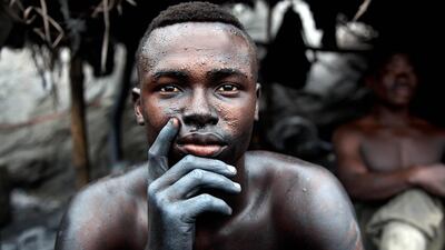 This photograph titled 'Blue Hand' shows a man enslaved in illegal gold mining in Ghana. "They are forced to spend 48 to 72 hours deep in the mines shafts," says Lisa Kristine, an American photographer who spent years documenting modern day slavery around the world. Photos: Lisa Kristine.