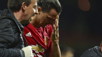 Manchester United's Zlatan Ibrahimovic leaves the field against Anderlecht with an injury. Dave Thompson / AP Photo
