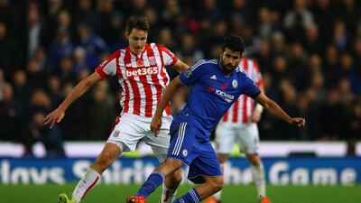 Diego Costa of Chelsea and Philipp Wollscheid of Stoke City. Getty Images