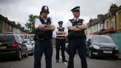Police officers on duty in east London following a raid on the gym over the June 3 terror attack. Daniel Leal-Olivas / AFP Photo