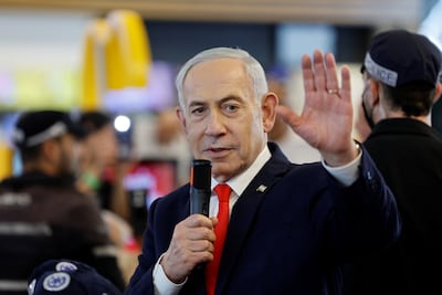 Israeli Prime Minister Benjamin Netanyahu meets voters as the election looms. Reuters