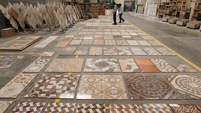 RAK Ceramics has grown to be an industry heavyweight, producing 110 million square metres of tiles per year with 6,000 product lines. Pawan Singh / The National