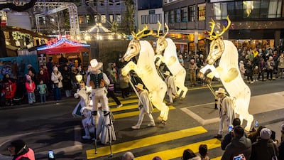 Artists of the French company Remue Menage perform at the Bo Noel event in Lausanne, Switzerland. EPA