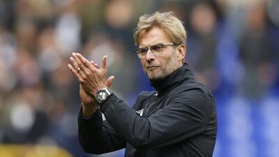Liverpool manager Jurgen Klopp applauds the away fans after the team's draw against Tottenham Hotspur at White Hart Lane on Saturday. John Sibley / Getty Images / Reuters / October 17, 2015