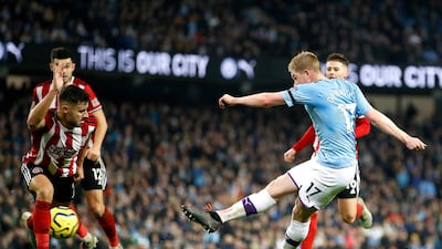 Manchester City's Kevin De Bruyne (right) scores his side's second goal of the game during the Premier League match at The Etihad Stadium, Manchester. PA Photo. Picture date: Sunday December 29, 2019. See PA story SOCCER Man City. Photo credit should read: Martin Rickett/PA Wire. RESTRICTIONS: EDITORIAL USE ONLY No use with unauthorised audio, video, data, fixture lists, club/league logos or "live" services. Online in-match use limited to 120 images, no video emulation. No use in betting, games or single club/league/player publications.