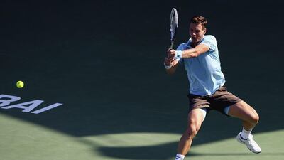 Tomas Berdych plays a shot against Jeremy Chardy during a win in the first round of the Dubai Duty Free Tennis Championships on Tuesday. Francois Nel / Getty Images