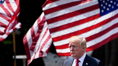 President Trump who entered office on the promise of an 'America First' policy has accused China of stealing US intellectual property in an effort to dominate the development of advanced technology. / AFP / Brendan Smialowski