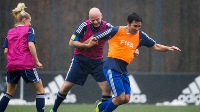 New Fifa president Gianni Infantino (L) fights for the ball with Deco of Portugal during a Fifa Team Friendly Football Match at the Fifa headquarters on February 29, 2016 in Zurich, Switzerland. (Photo by Philipp Schmidli/Getty Images)