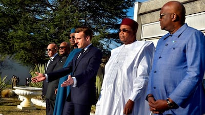 President Macron and the leaders of the G5 Sahel group lay a wreath in memory of French soldiers killed in a helicopter collision last year. AFP