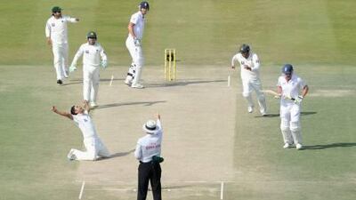 Abdur Rehman, arms raised, took six England wickets in Abu Dhabi yesterday and could seemingly do no wrong.