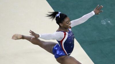United States’ Simone Biles performs on the floor during the women’s gymnastics individual all-around final at the 2016 Rio Olympics at Rio Olympic Arena on August 11, 2016 in Rio de Janeiro, Brazil. Julio Cortez / AP Photo