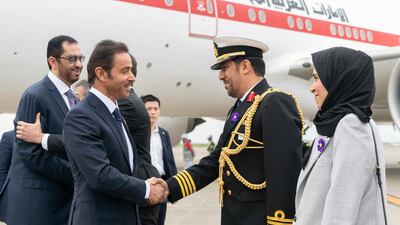Sheikh Hazza bin Zayed, Vice Chairman of the Abu Dhabi Executive Council, left, arrives to Tokyo Haneda International airport. Ministry of Presidential Affairs