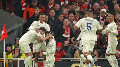 Morgan Gibbs-White, centre, celebrates with teammates after scoring his Forest's third goal. AP